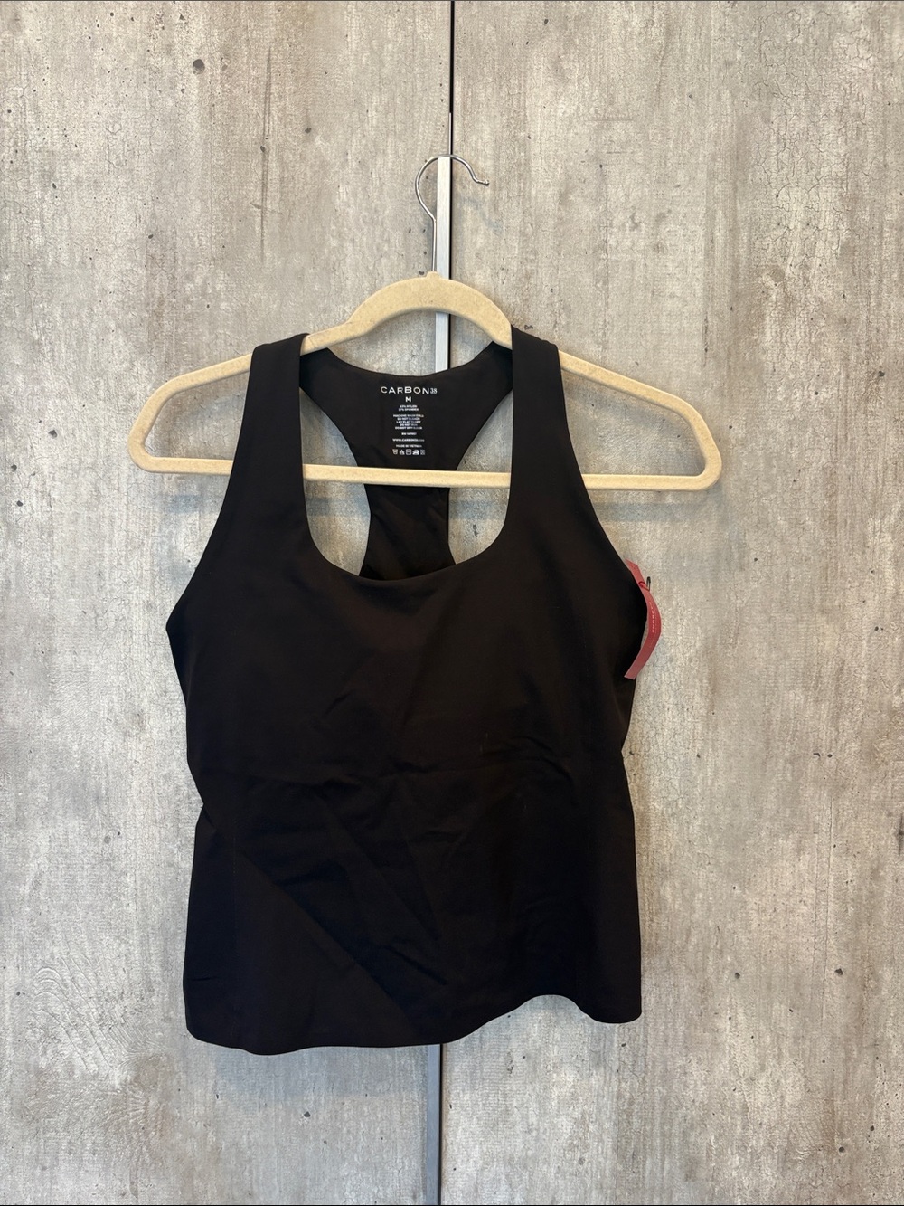 Carbon38 Black Performance Racerback Tank with Red Tag